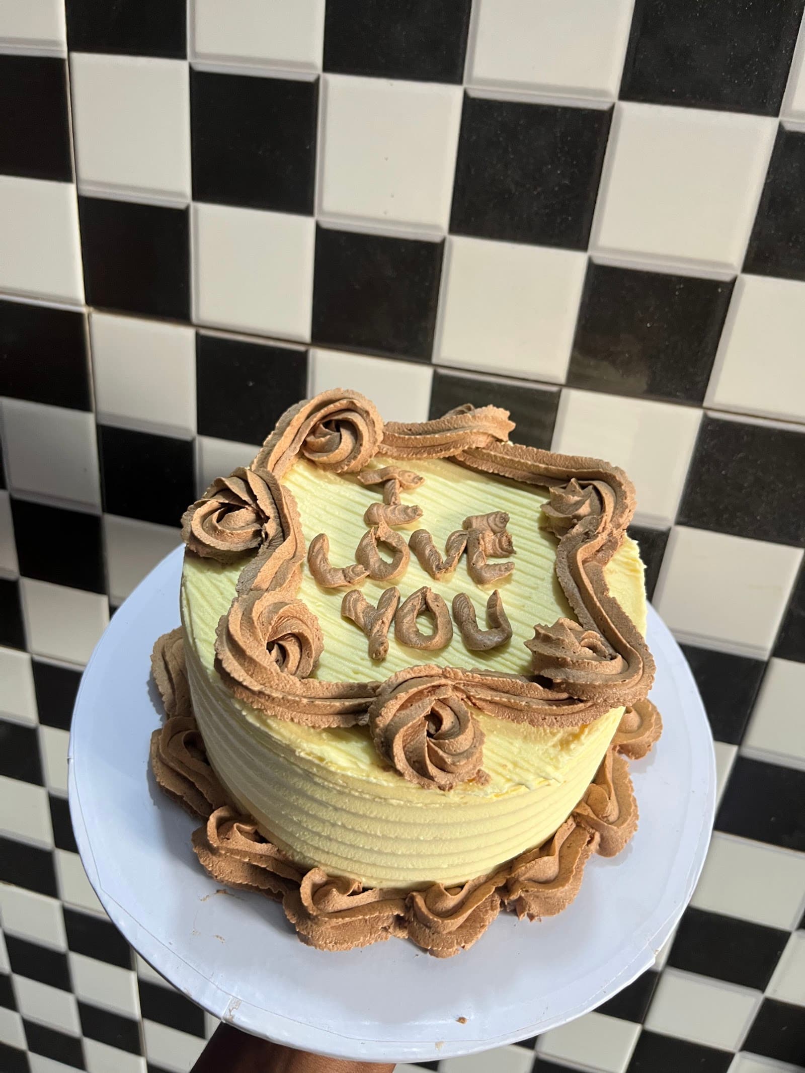 Vintage piped cake reading I love you