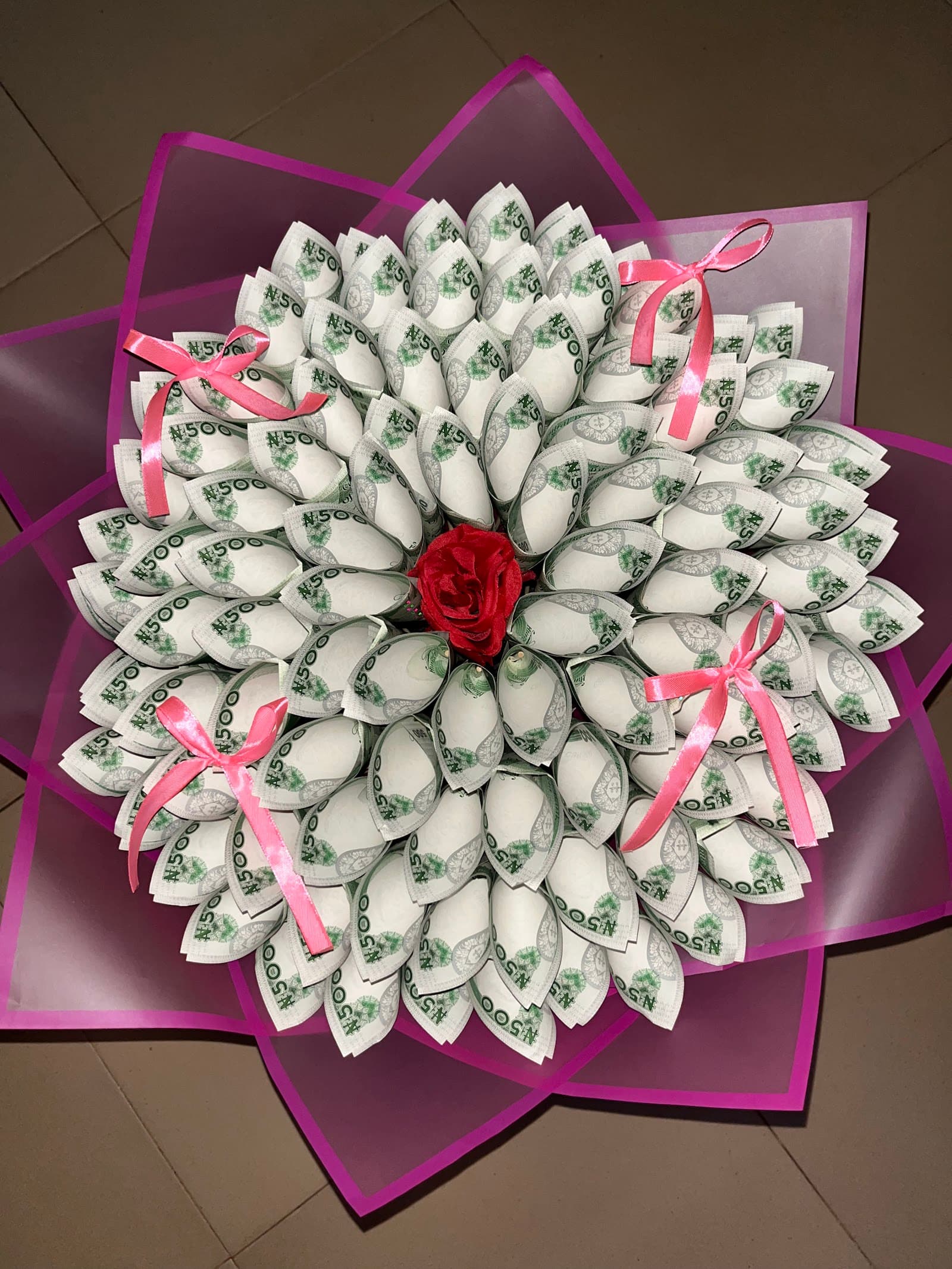 Money bouquet with pink ribbons